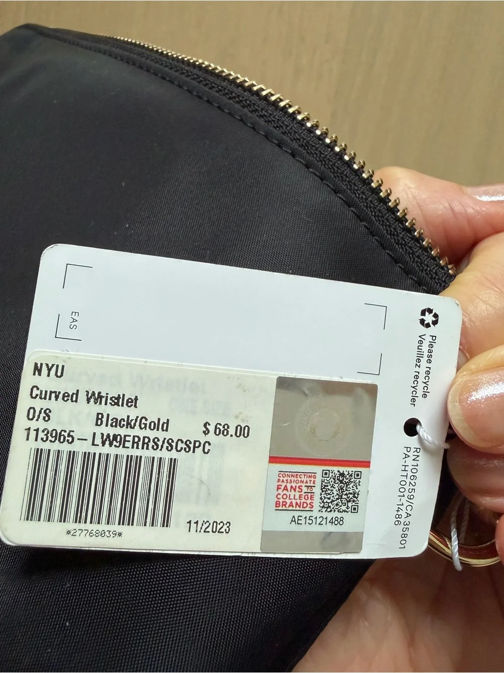 NWT Lululemon Black Wristlet Pouch with NYU logo